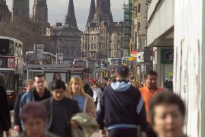 People walking down Princes Street in Edinburgh